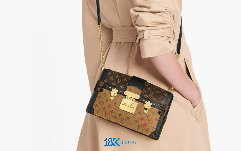 tui lv hop trunk clutch trunk bag