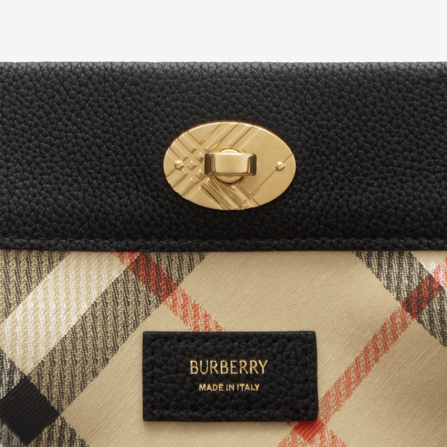 Tui Cotswolds Pouch Black (6) Tui Cotswolds Pouch Black (6)