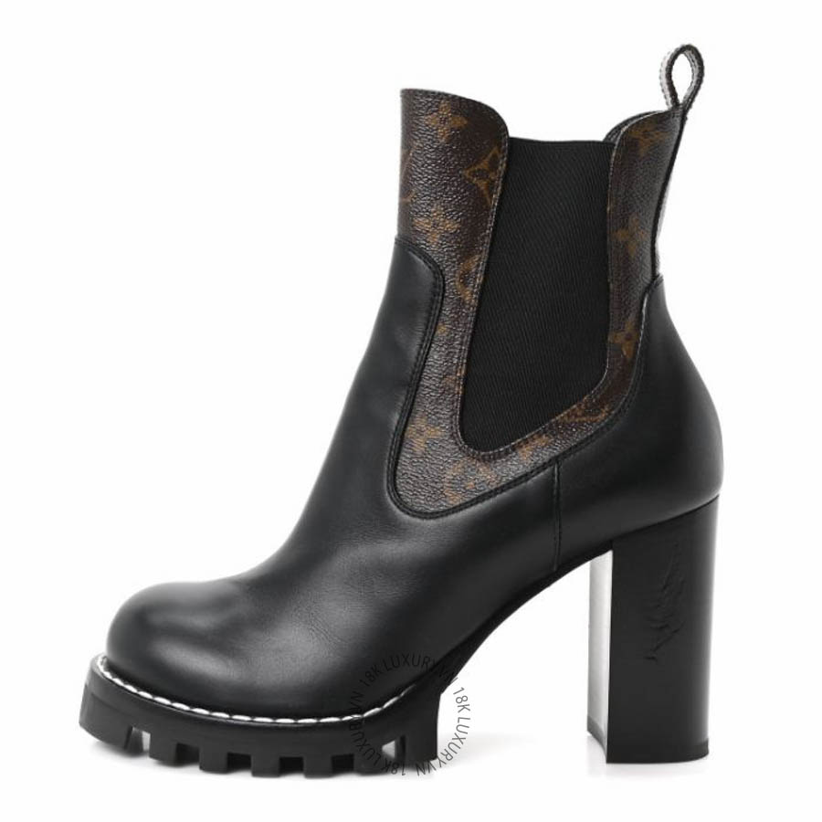 Boots cao gót Louis Vuitton Calfskin Monogram Star Trail Chelsea Ankle Boots Black FPGL108