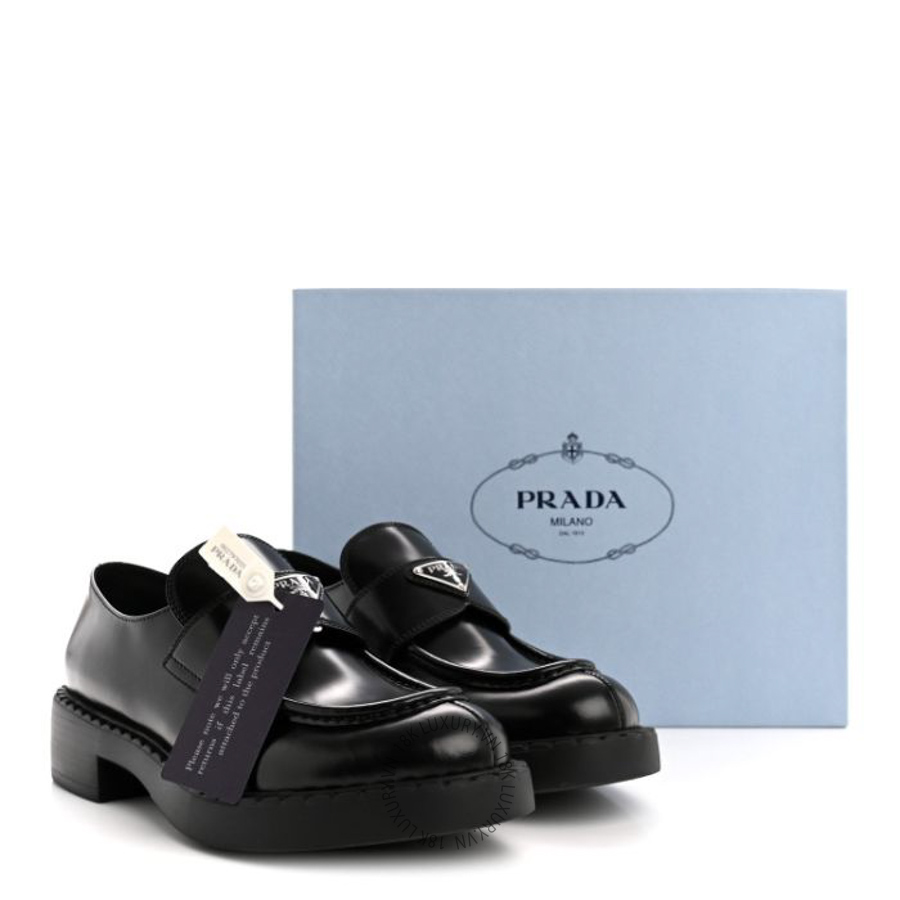 Giày loafer Prada Spazzolato Metal Triangle Logo Loafers Black PRG17 17 Giày loafer Prada Spazzolato Metal Triangle Logo Loafers Black PRG17