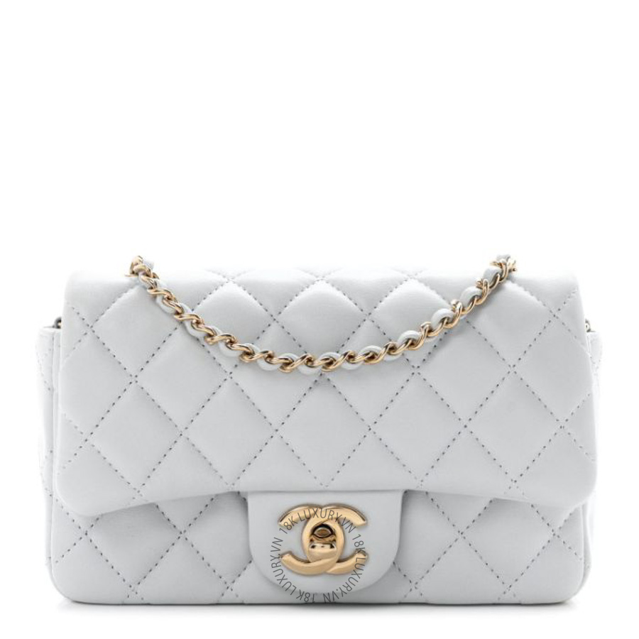Túi đeo chéo mini Chanel Lambskin Quilted Extra Mini Rectangular Flap Light Blue FPTC230