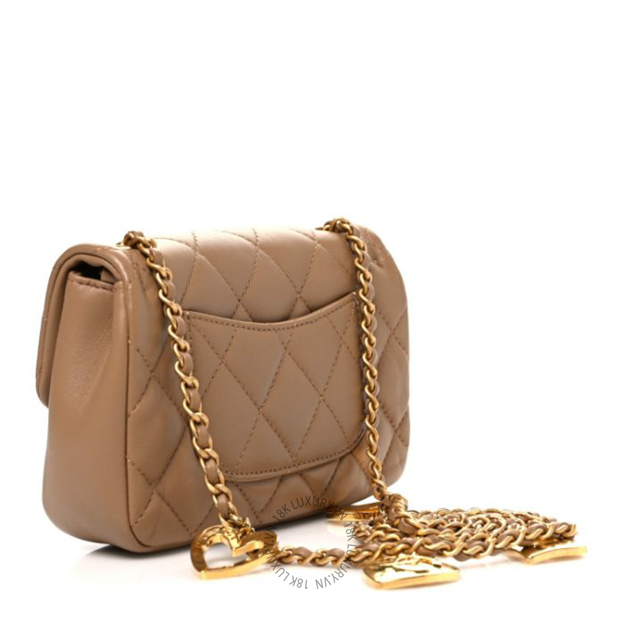 Túi đeo chéo mini Chanel Lambskin Quilted Mini Heart Charms Flap Beige FPTC583