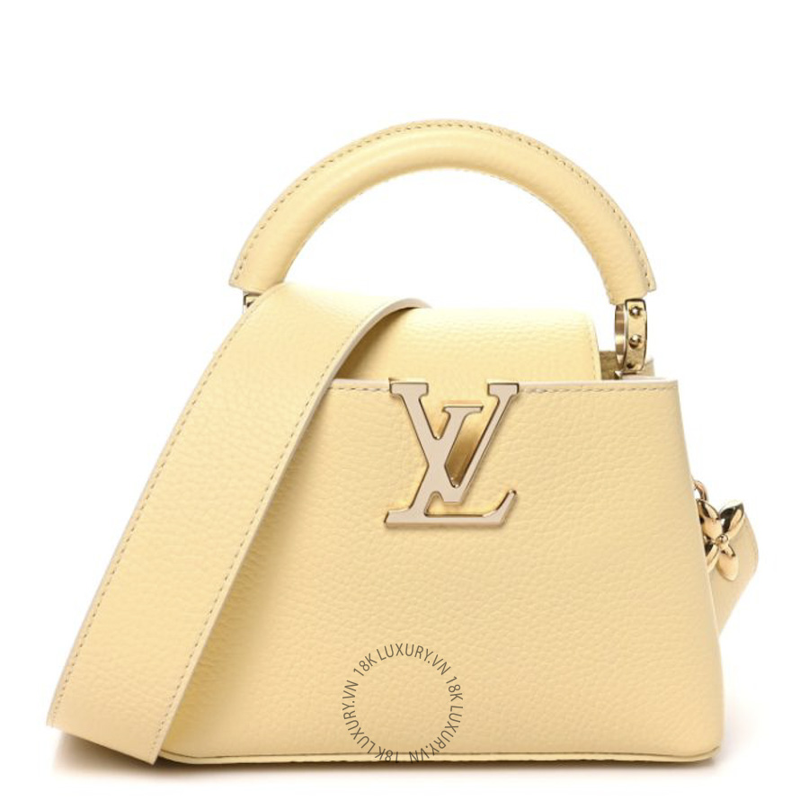 Túi Xách Đeo Chéo Louis Vuitton Taurillon MiniMe Capucines Mini Banane NSBD011