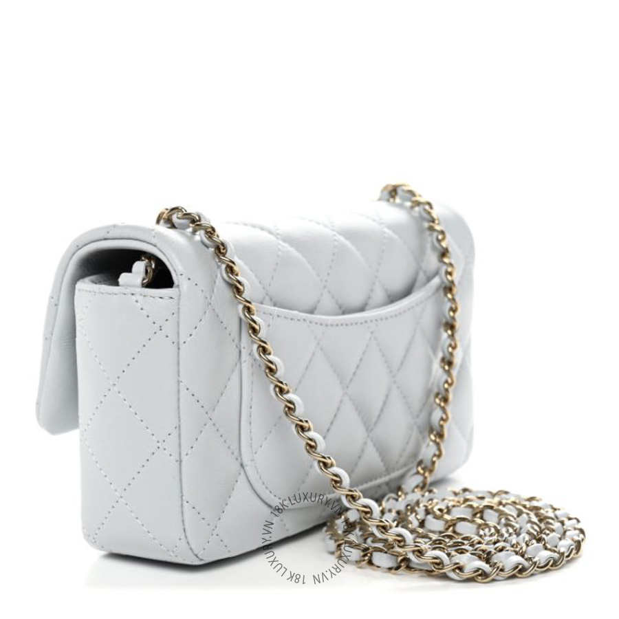 Túi Đeo Chéo Chanel Lambskin Quilted Extra Mini Rectangular Flap Light Blue CDBC925